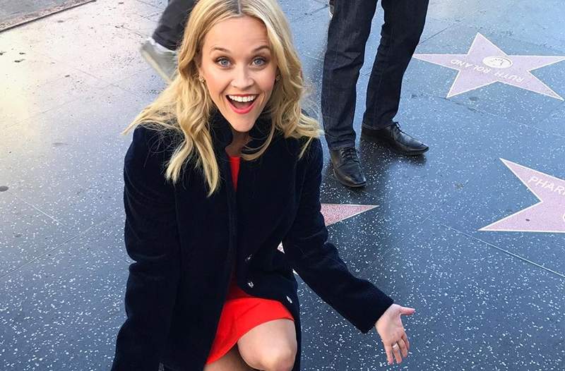 Reese Witherspoon's Cheeky Cleating Habit se podvoji kot * samo * spodbujevalnik zaupanja, ki ga potrebujete